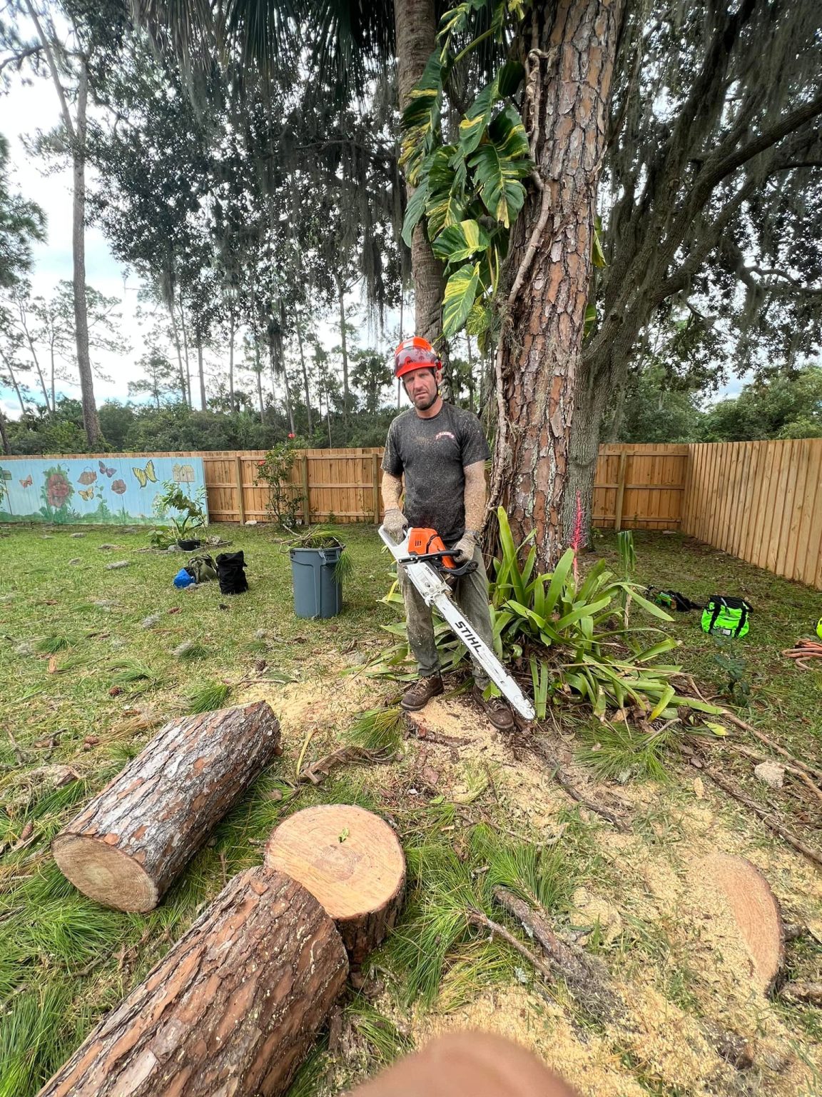 Ranger crew member with chainsaw